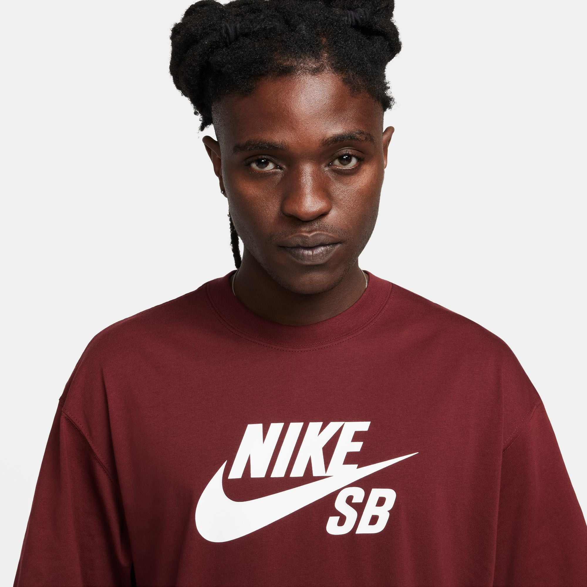Logo T-shirt from Nike SB, in dark red colour with large white Nike SB Logo on front.