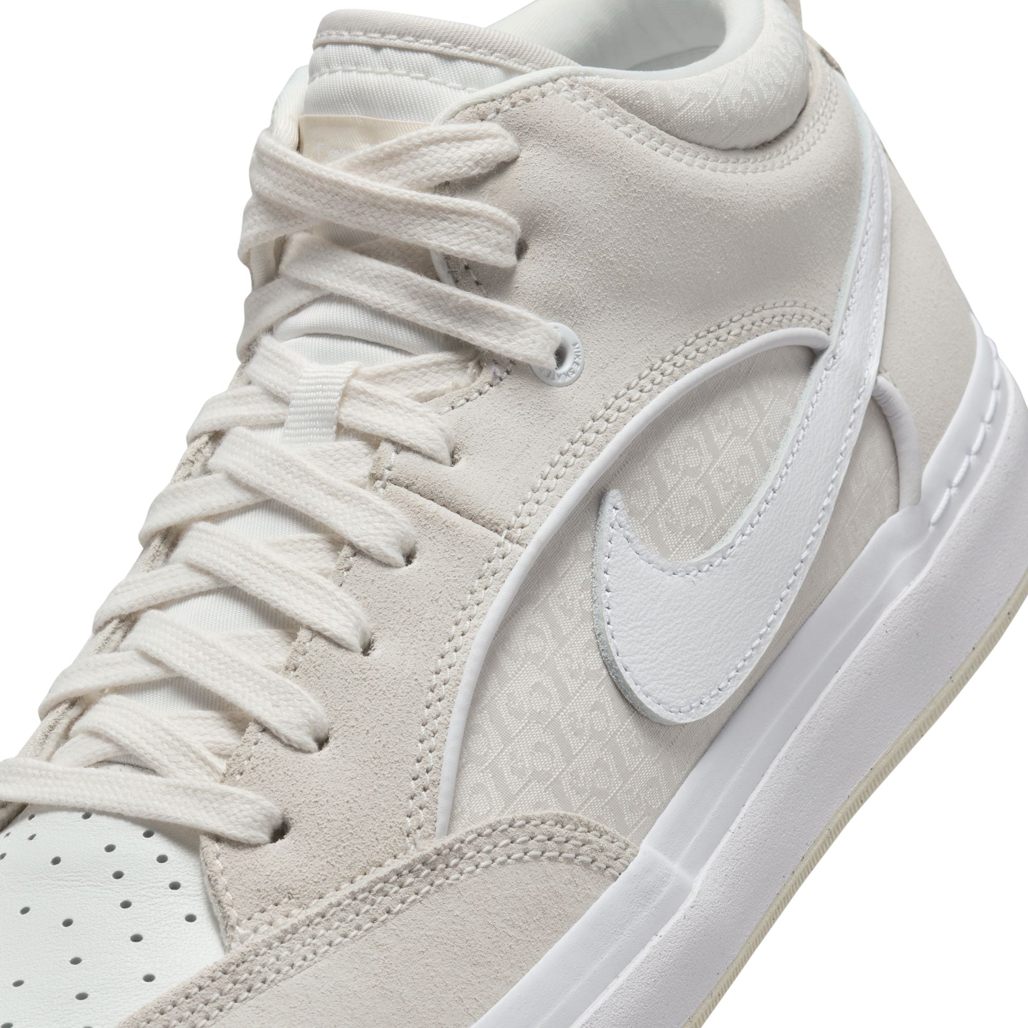 Cream white nike sb Leo Baker react mid top shoes with cream soles and white and cream details. Free uk shipping over £50