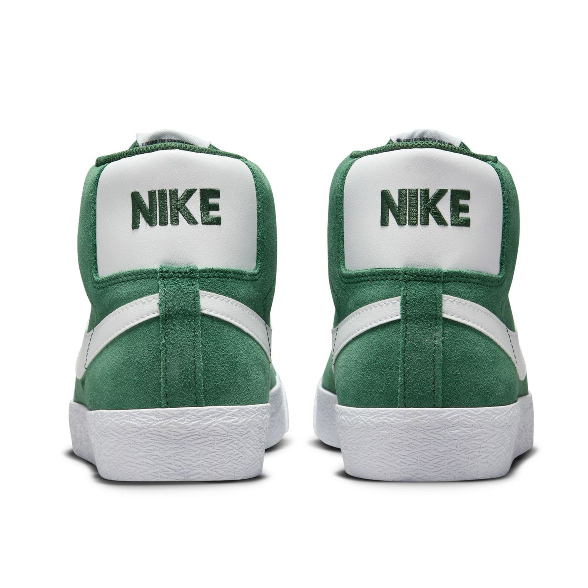 Mid top Nike SB Blazer Mid skate shoes, in Fir Green colourway with white Nike swoosh on sides.