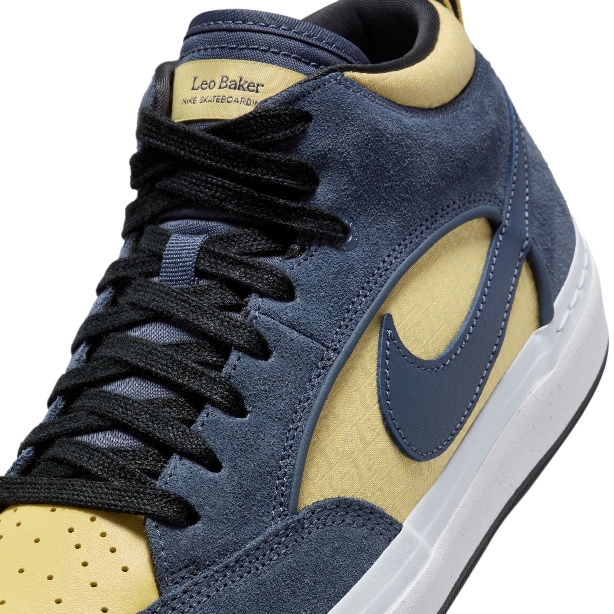 Mid top Nike SB Leo Baker skate shoes, in yellow and blue colourway, with white and black sole.