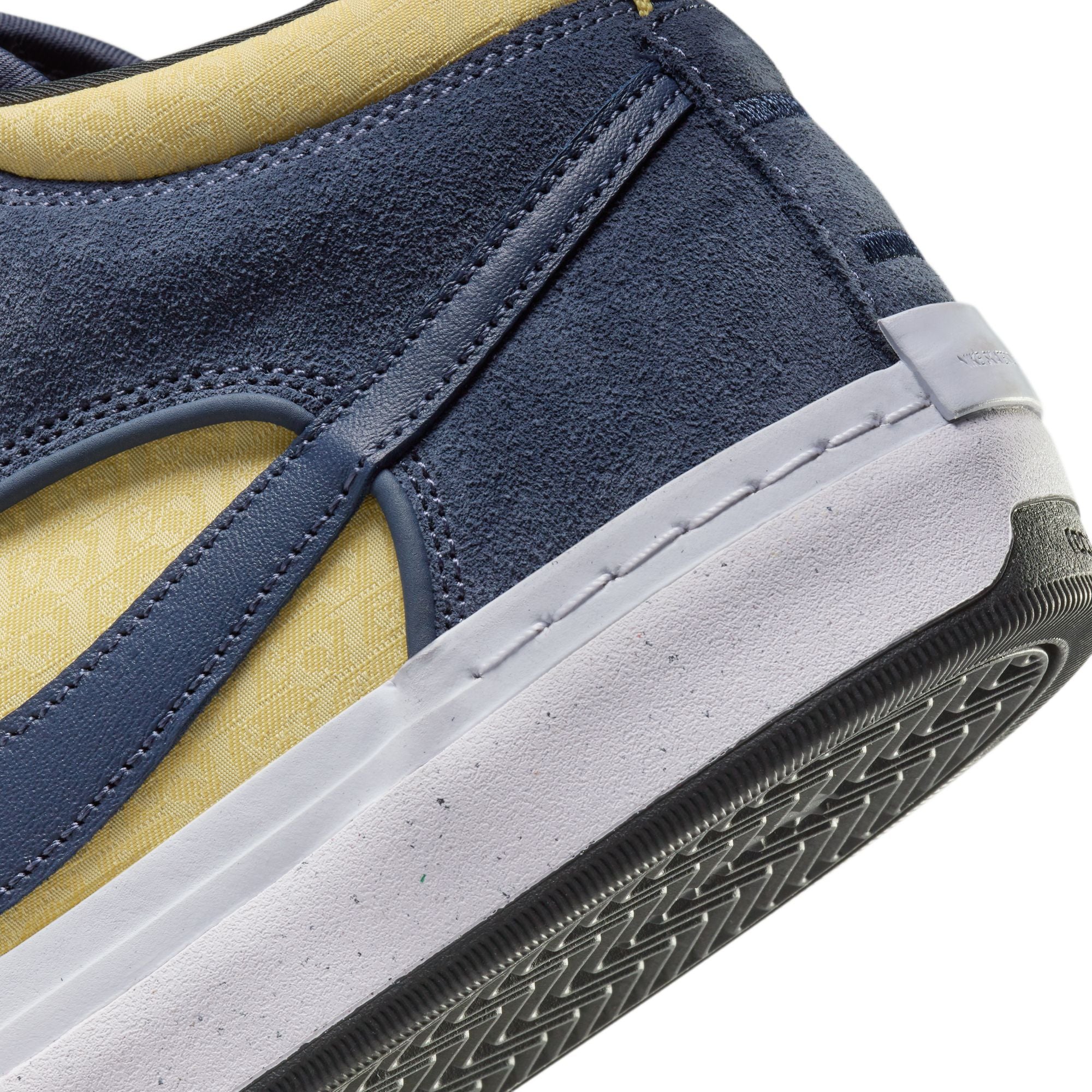 Mid top Nike SB Leo Baker skate shoes, in yellow and blue colourway, with white and black sole.