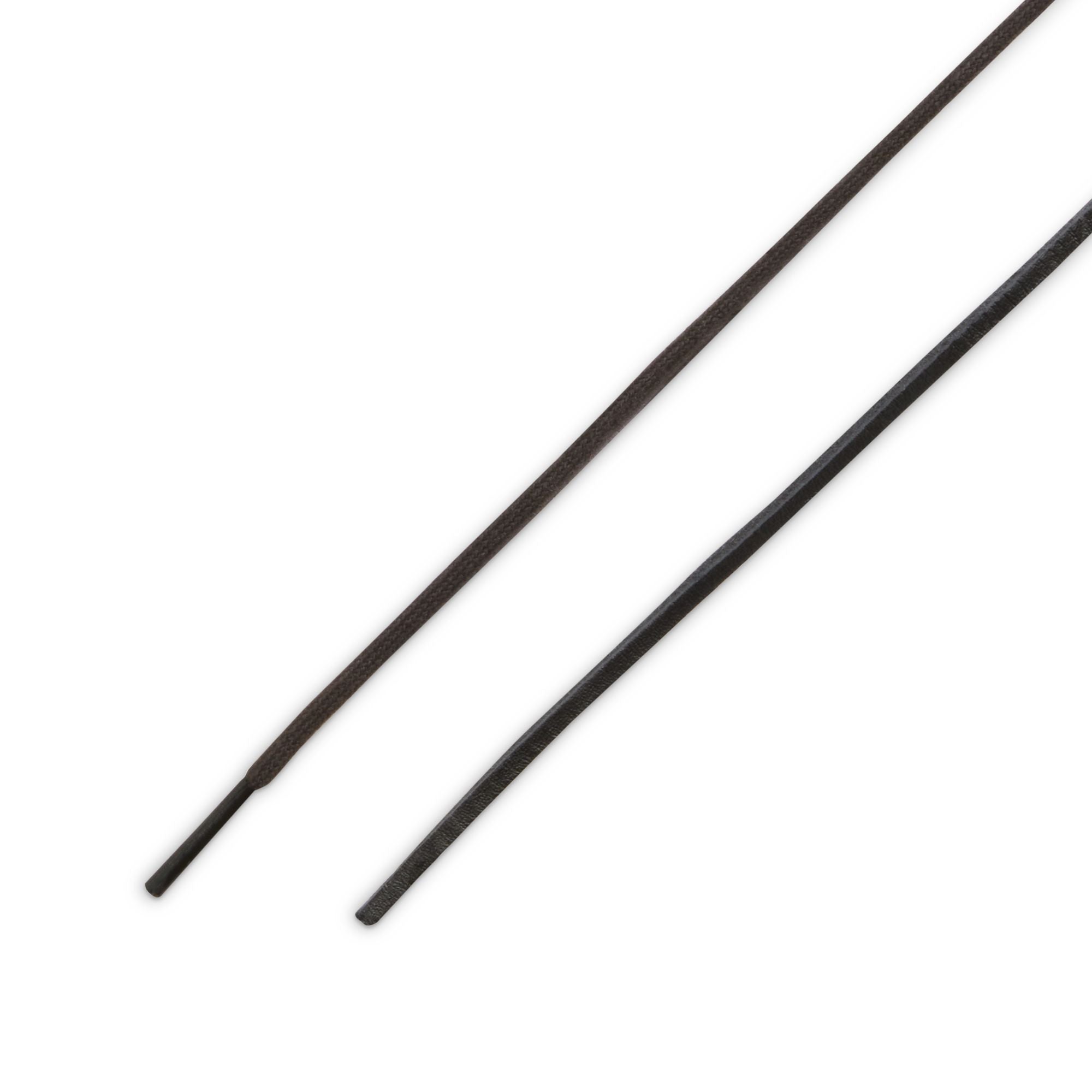 Low top Nike SB janoski skate shoes, in black and white colourway with white nike swoosh on sides.