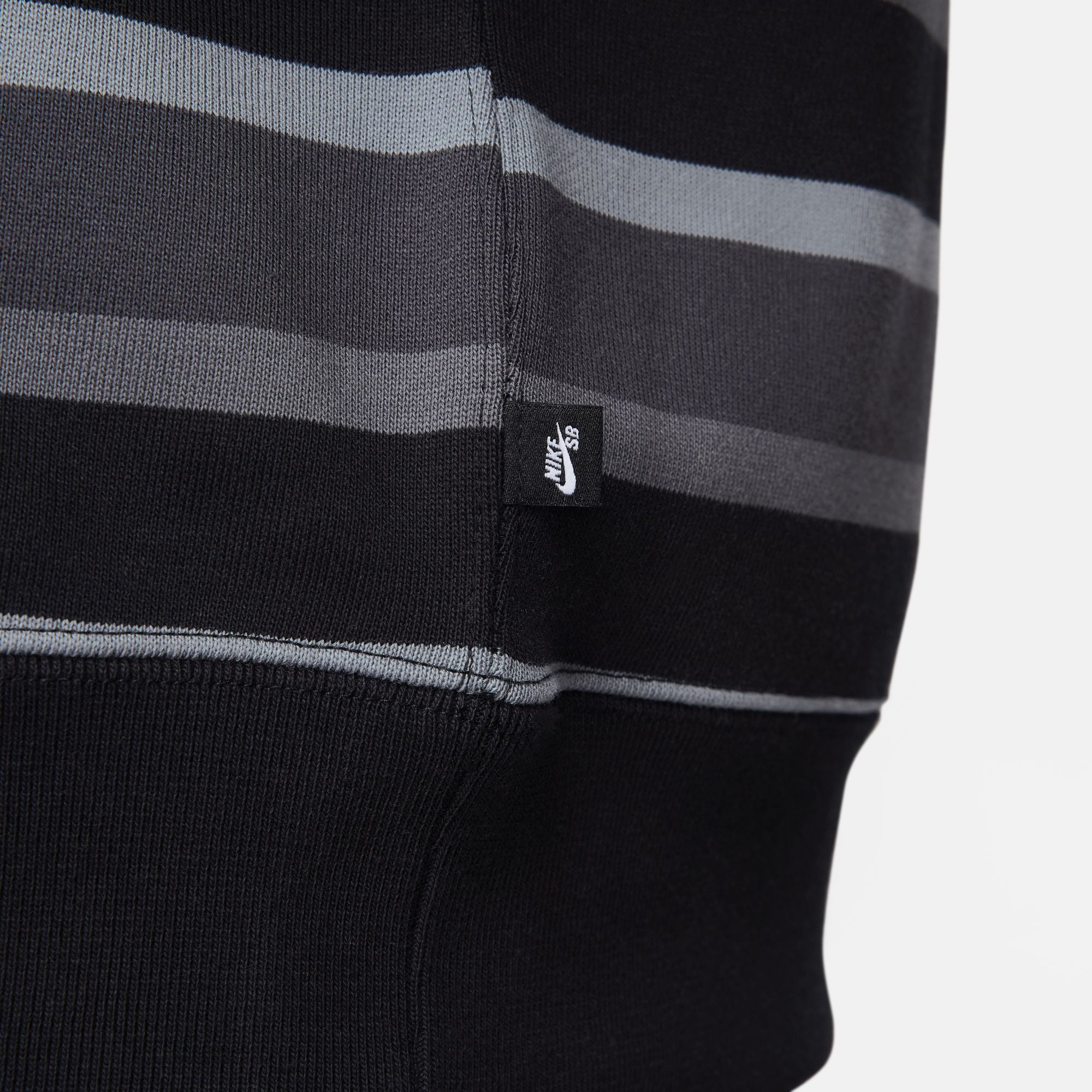 Black and grey striped full zip nike sb hoodie with white nike sb logo on chest. Free uk shipping over £50