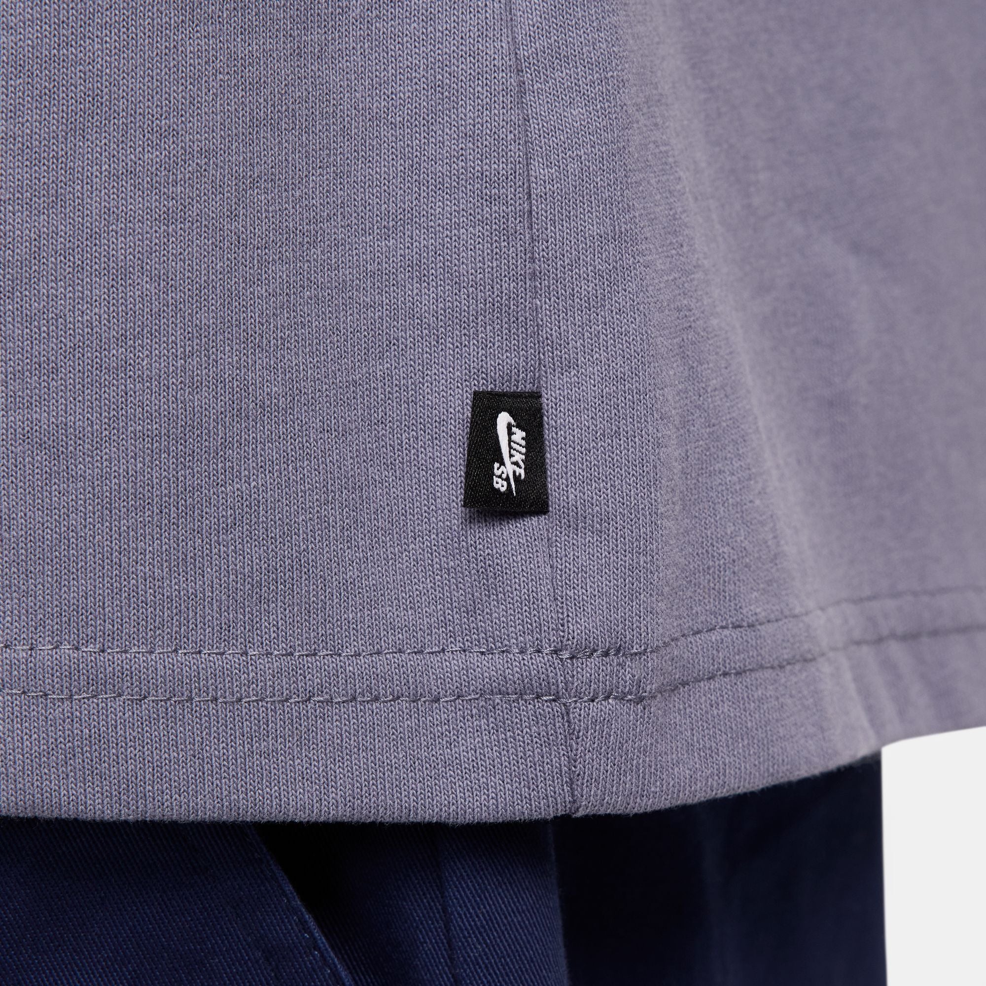 Purple nike sb shortsleeved T-shirt with feather logo on back and nike sb logo on chest. Free uk shipping over £50