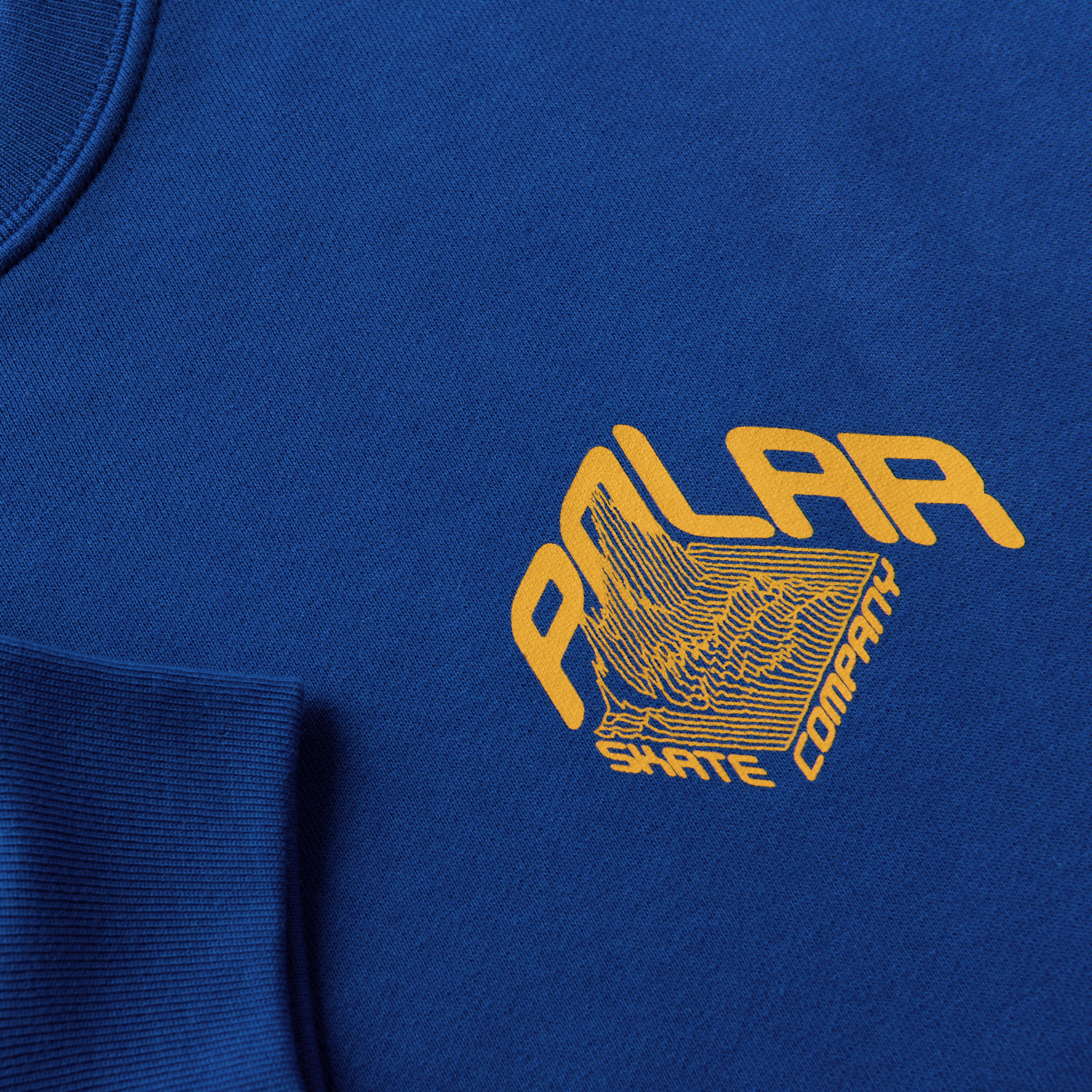 Deep blue polar Crewneck sweatshirt with orange logo on front. Free uk shipping on orders over £50