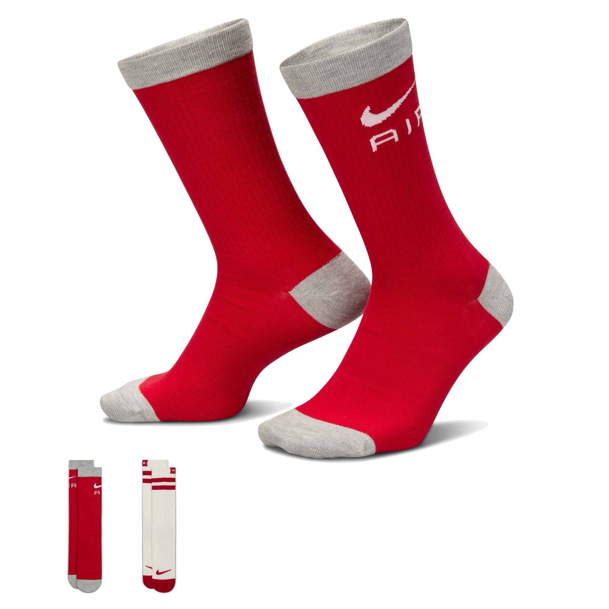 Two pairs of red grey and white red nike socks. Red stripes and a white nike swoosh logo. Free uk shipping over £50