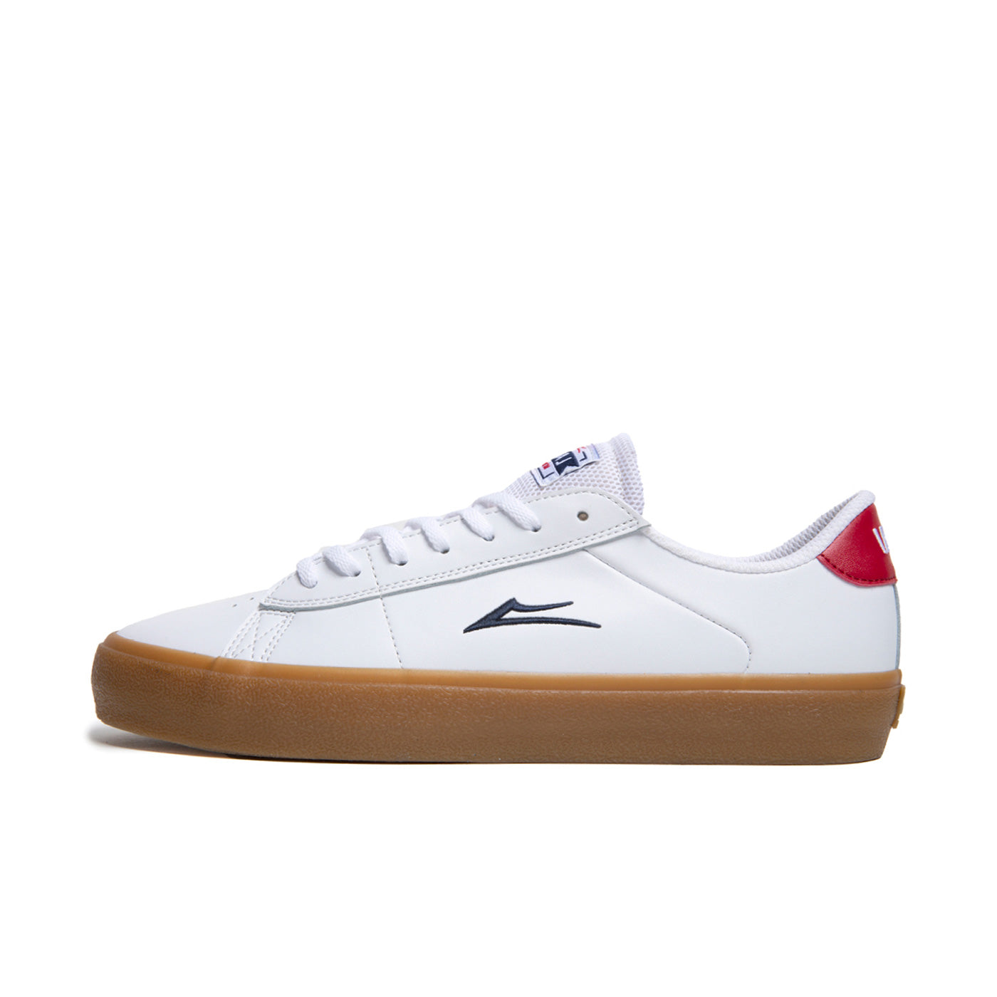 Low top Lakai Newport skate shoes, in white leather with small navy blue lakai logo on side and gum sole.