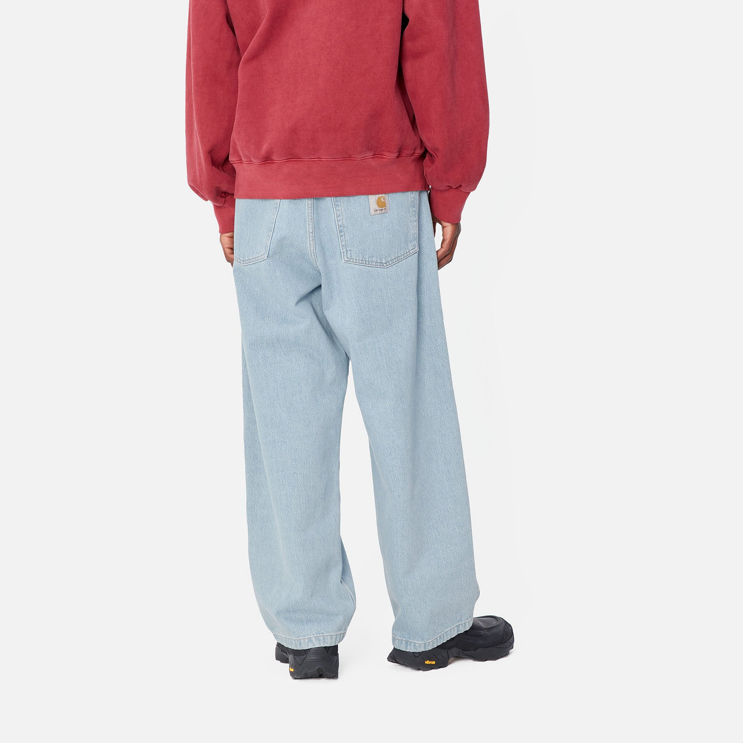 Loose fitting, bleached Carhartt pants with woven logo on a back pocket. Free UK shipping on orders over £50.