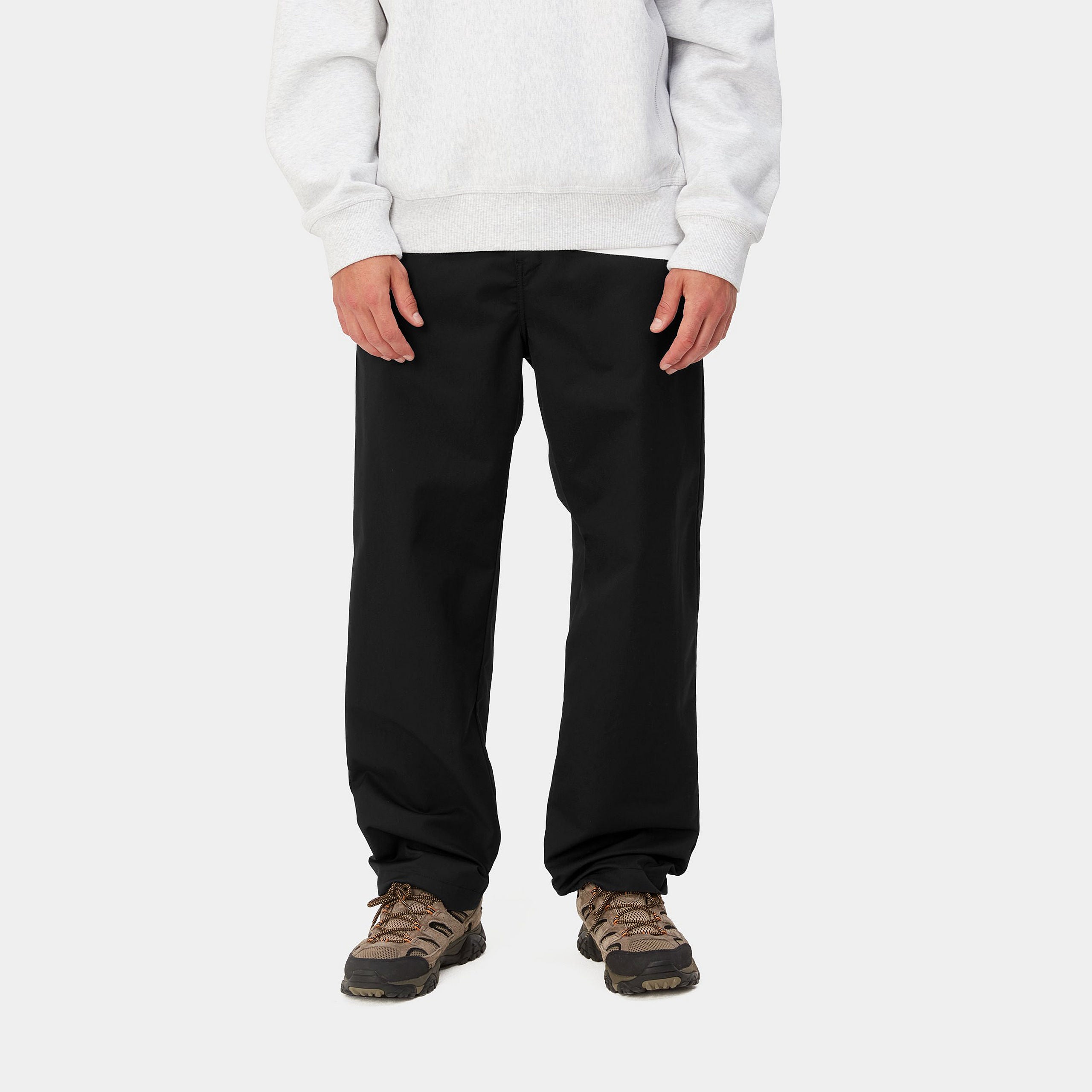 Black Carhartt craft pants with woven logo. Free UK shipping on orders over £50.