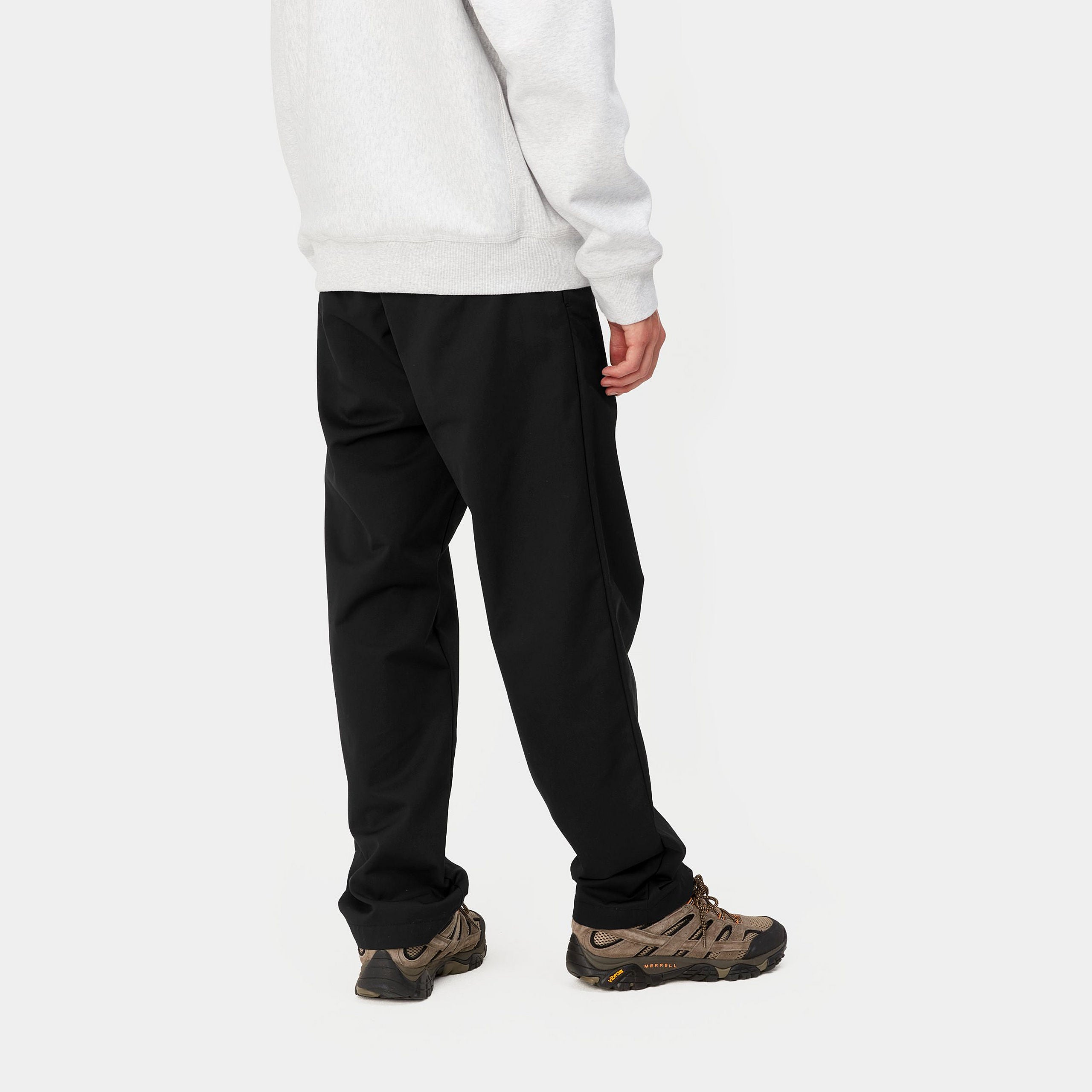 Black Carhartt craft pants with woven logo. Free UK shipping on orders over £50.