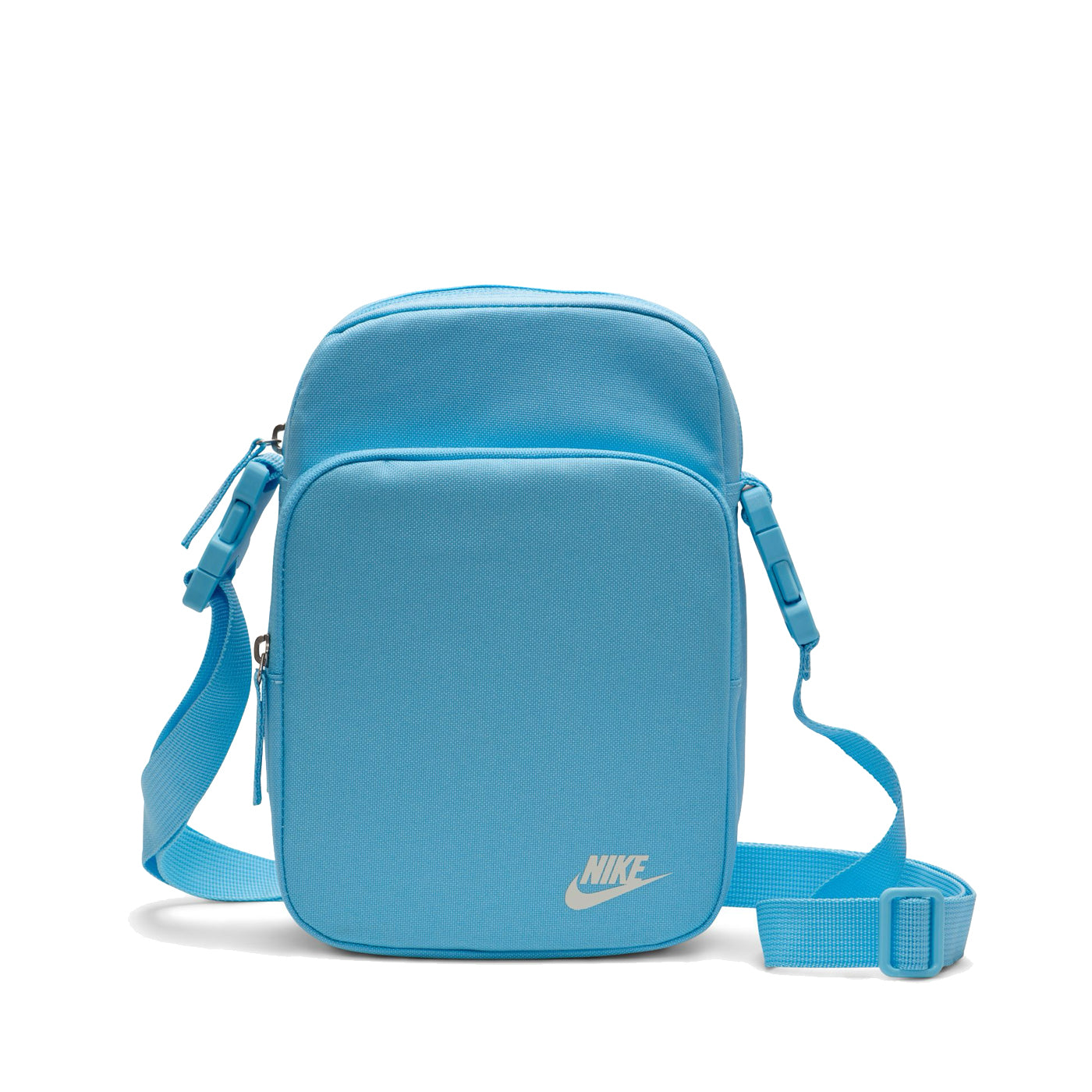 Blue Nike heritage shoulder bag with small white Nike logo on front. Features two separate zipped compartments