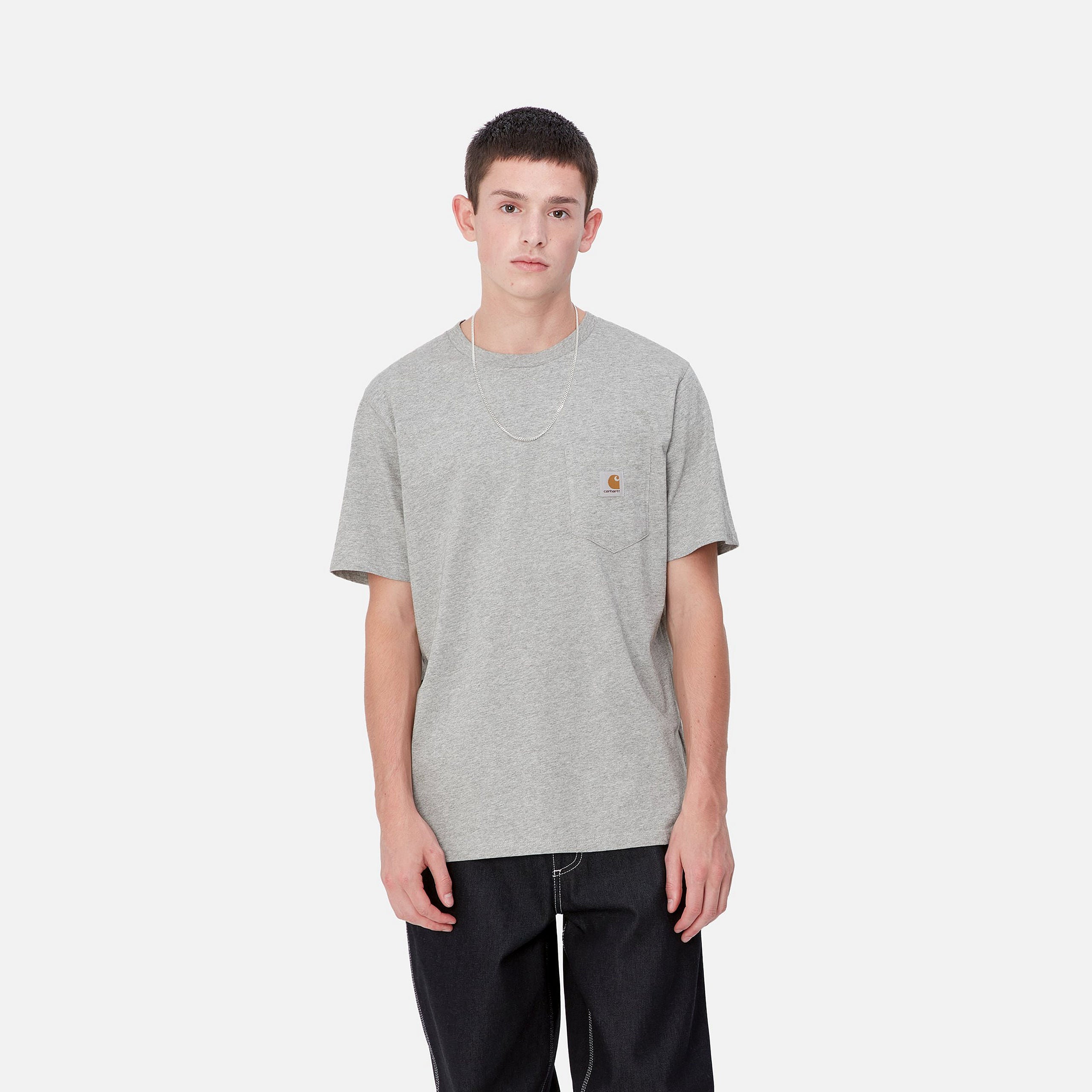 Grey Carhartt tshirt with woven logo on the front pocket. Free UK shipping on orders over £50.