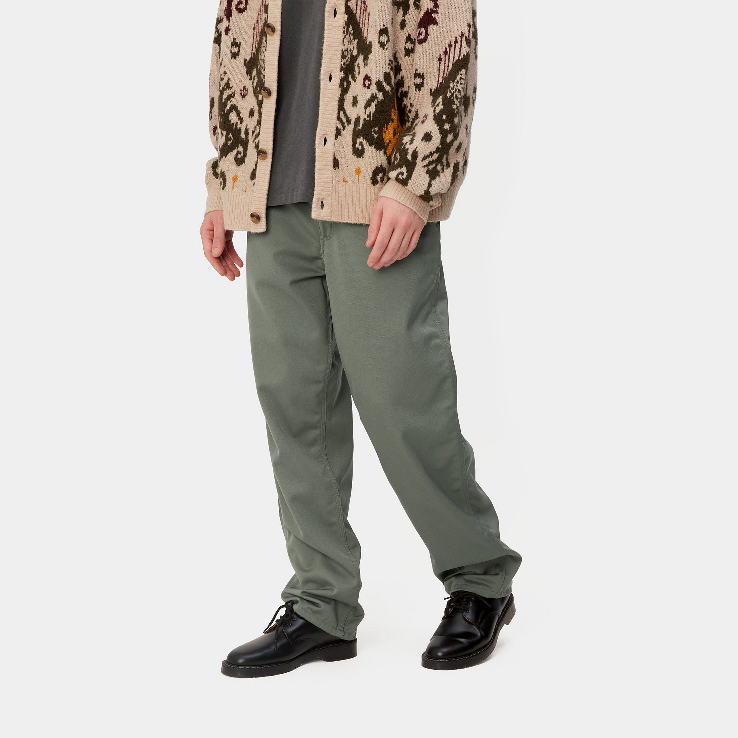 Light green Carhartt Simple pants with woven logo on the back pocket. Free UK shipping on orders over £50.
