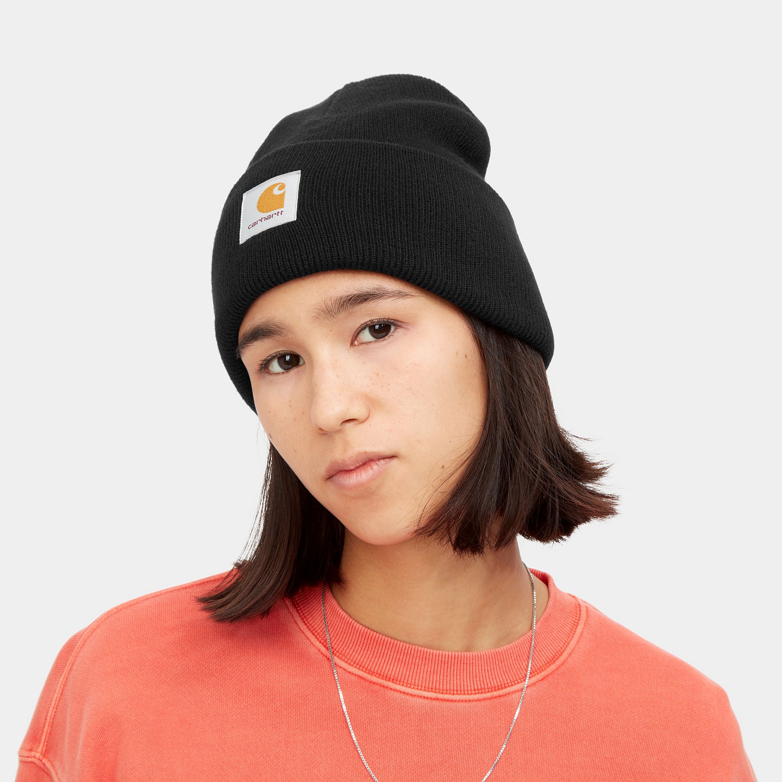 Black carhartt beanie with woven logo. Free UK shipping on orders over £50.