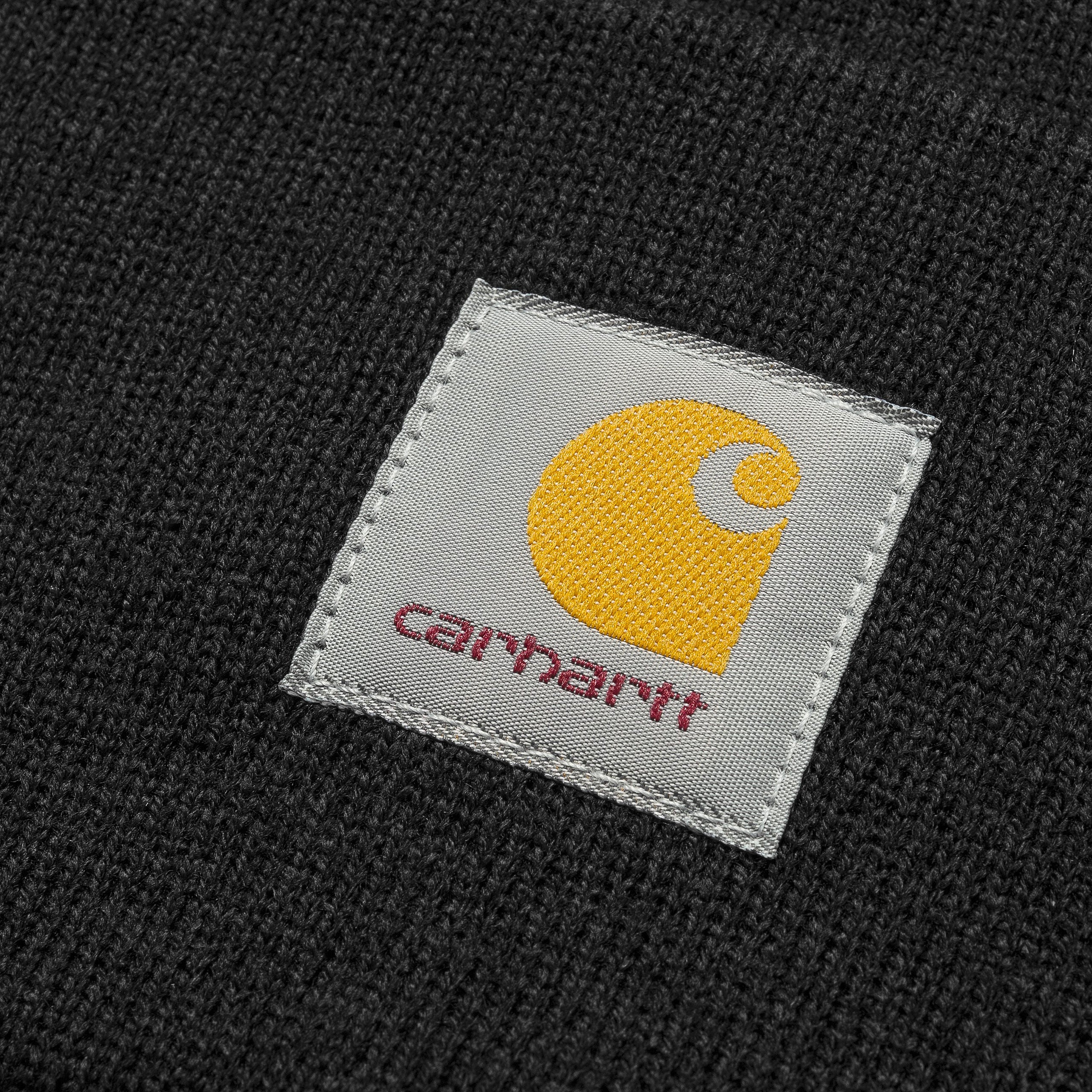 Black carhartt beanie with woven logo. Free UK shipping on orders over £50.