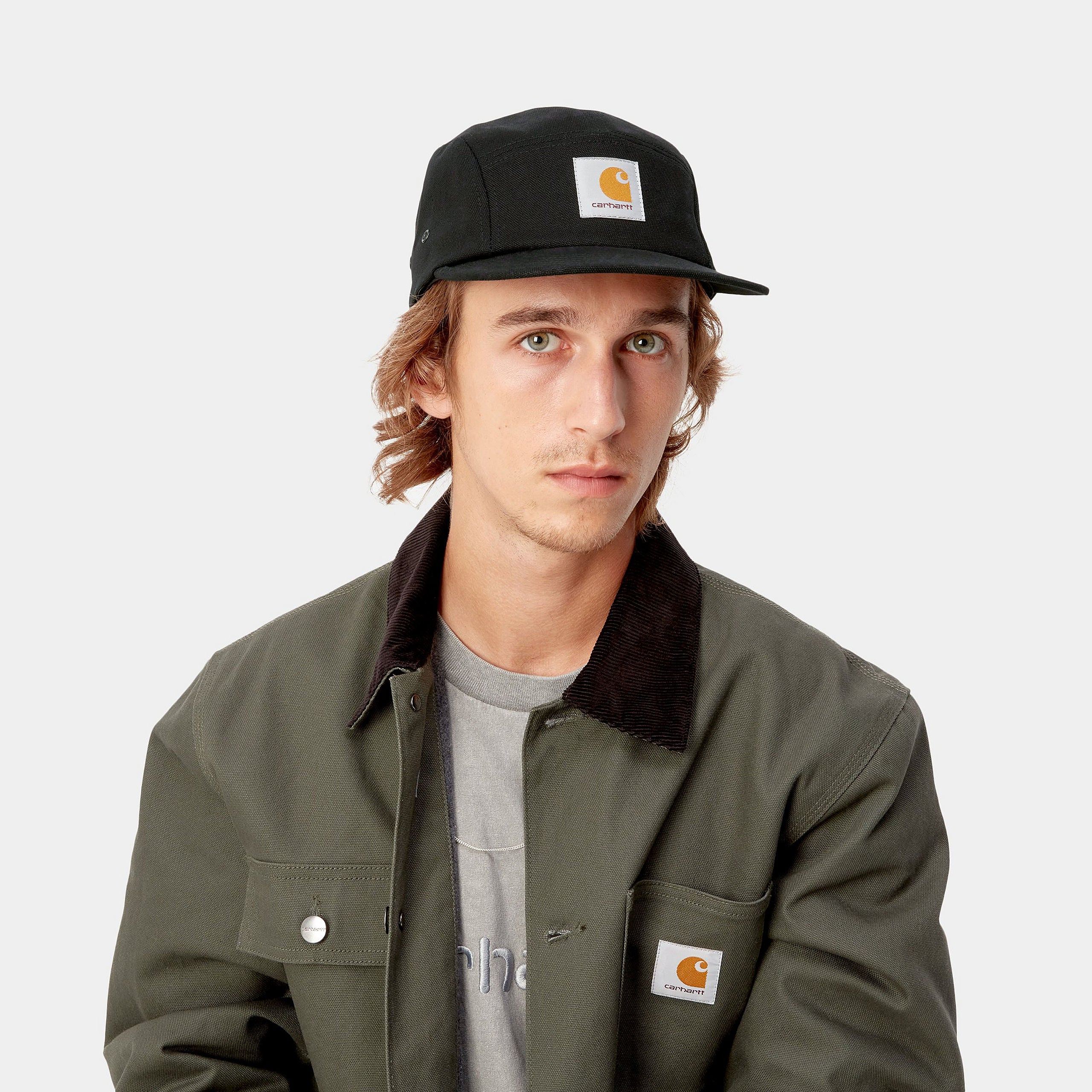 Black Carhartt cap with woven logo. Free UK shipping on orders over £50.