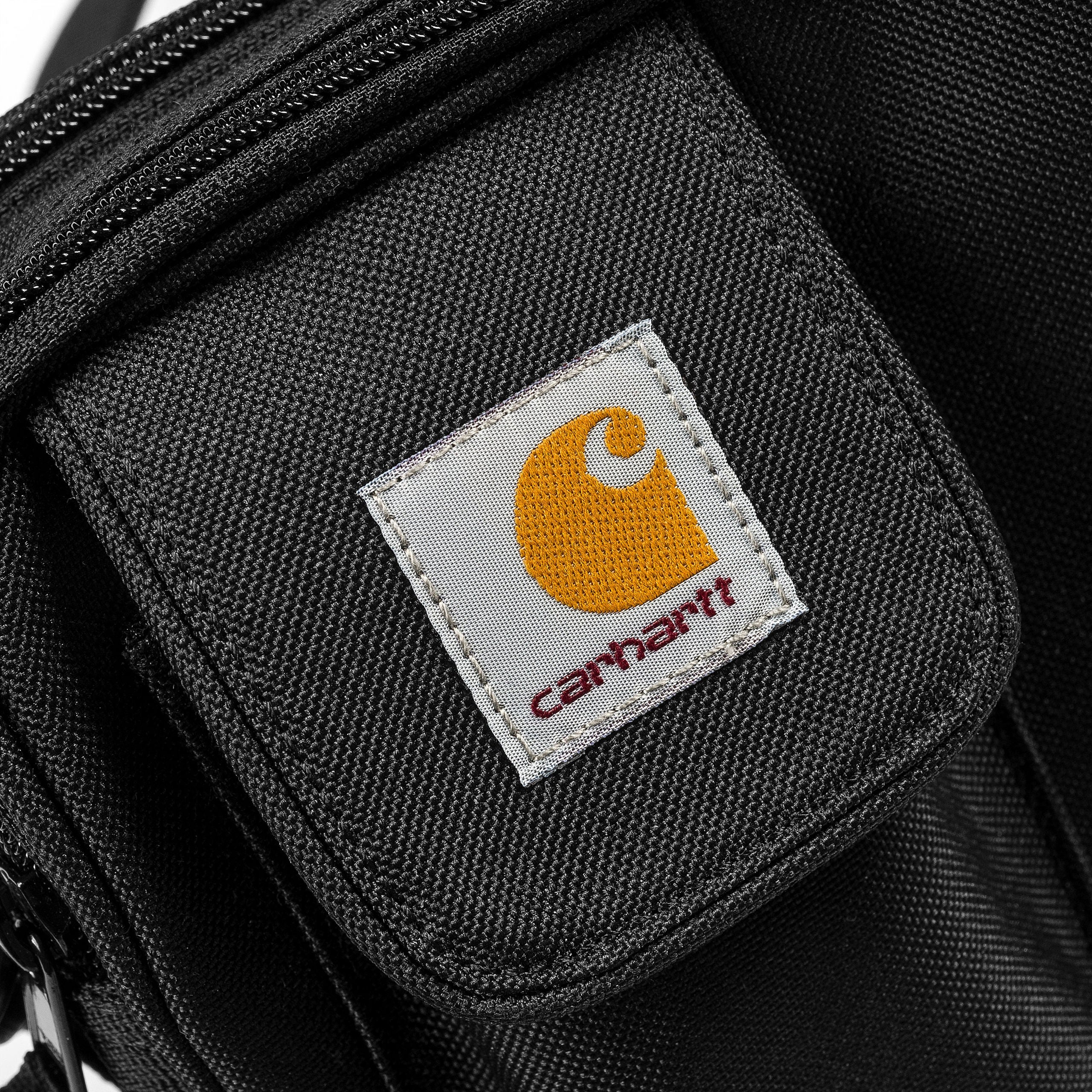 Small black Carhartt shoulder bag with woven logo. Free UK shipping on orders over £50.