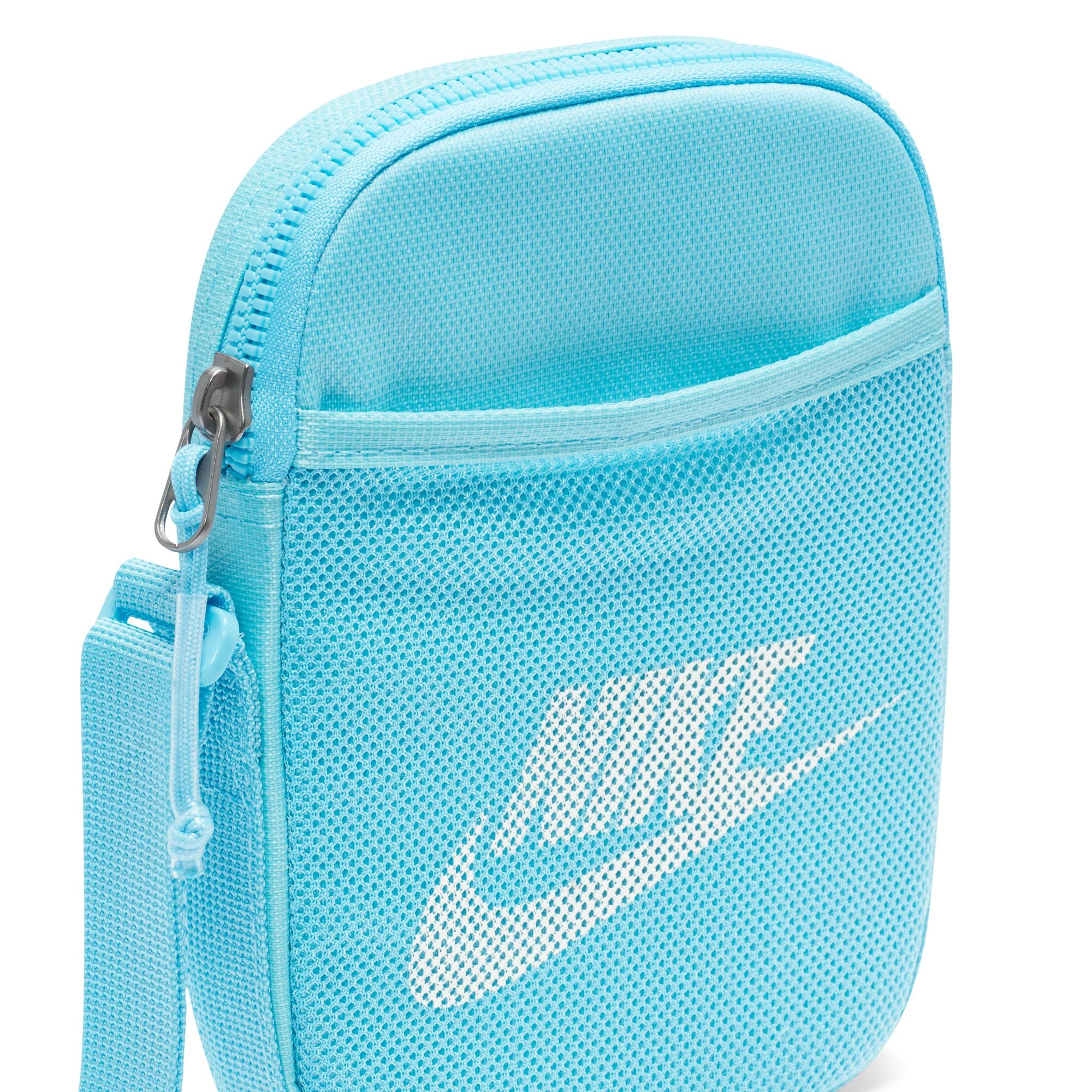 Light blue nike crossbody bag with mesh front pocket and white nike swoosh logo. Free uk shipping over £50