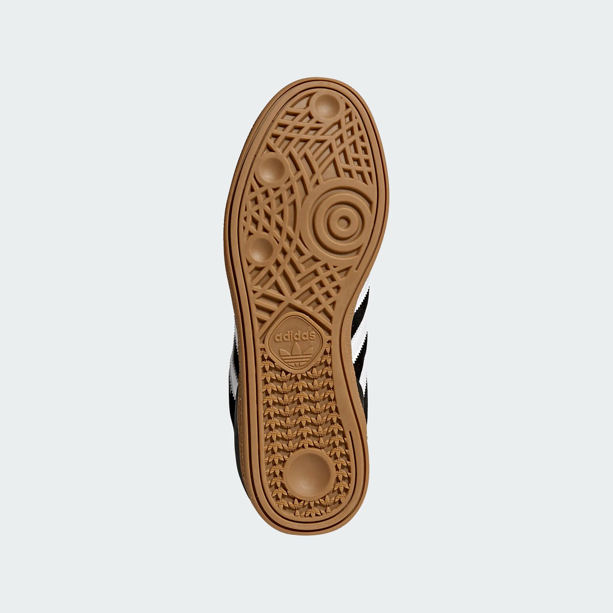 Close-up of an Adidas sneaker sole on a white background