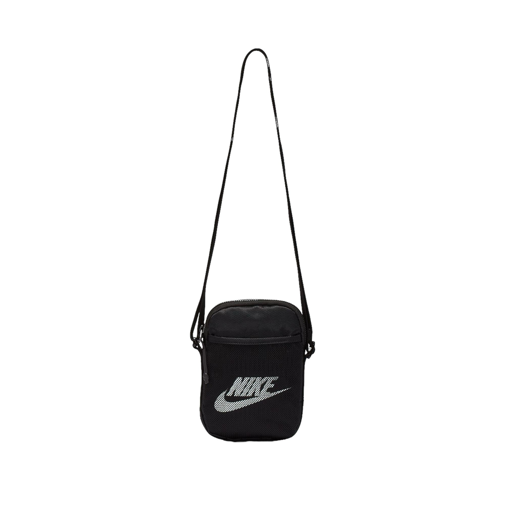 Black nike crossbody bag with mesh front pocket and white nike swoosh logo. Free uk shipping over £50
