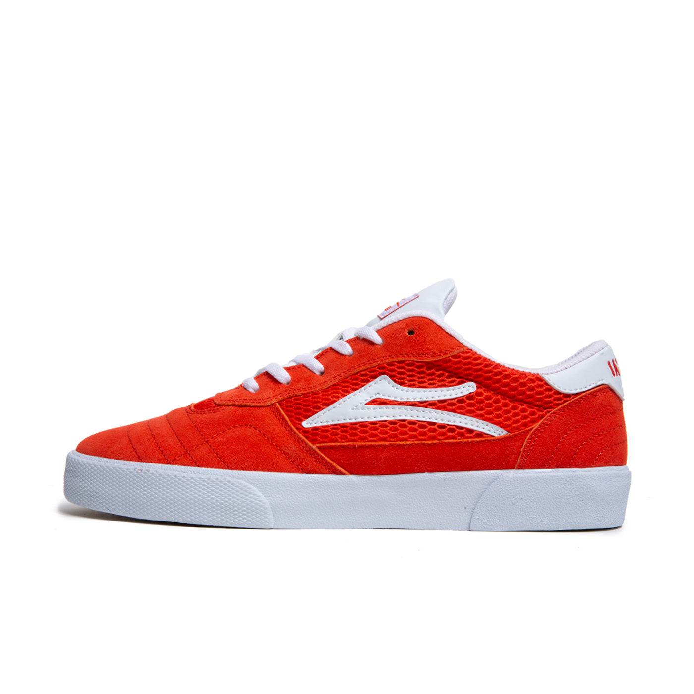 Low top Lakai Cambridge skate shoes, in orange colourway with white Lakai logo on the side.