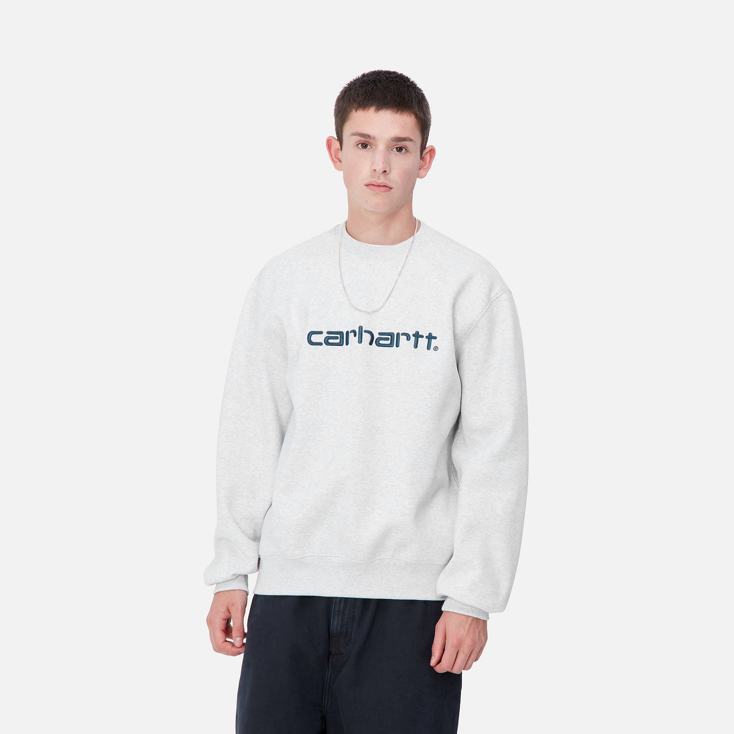 Grey Carhartt sweatshirt with dark blue embroidered logo. Free UK shipping on orders over £50.