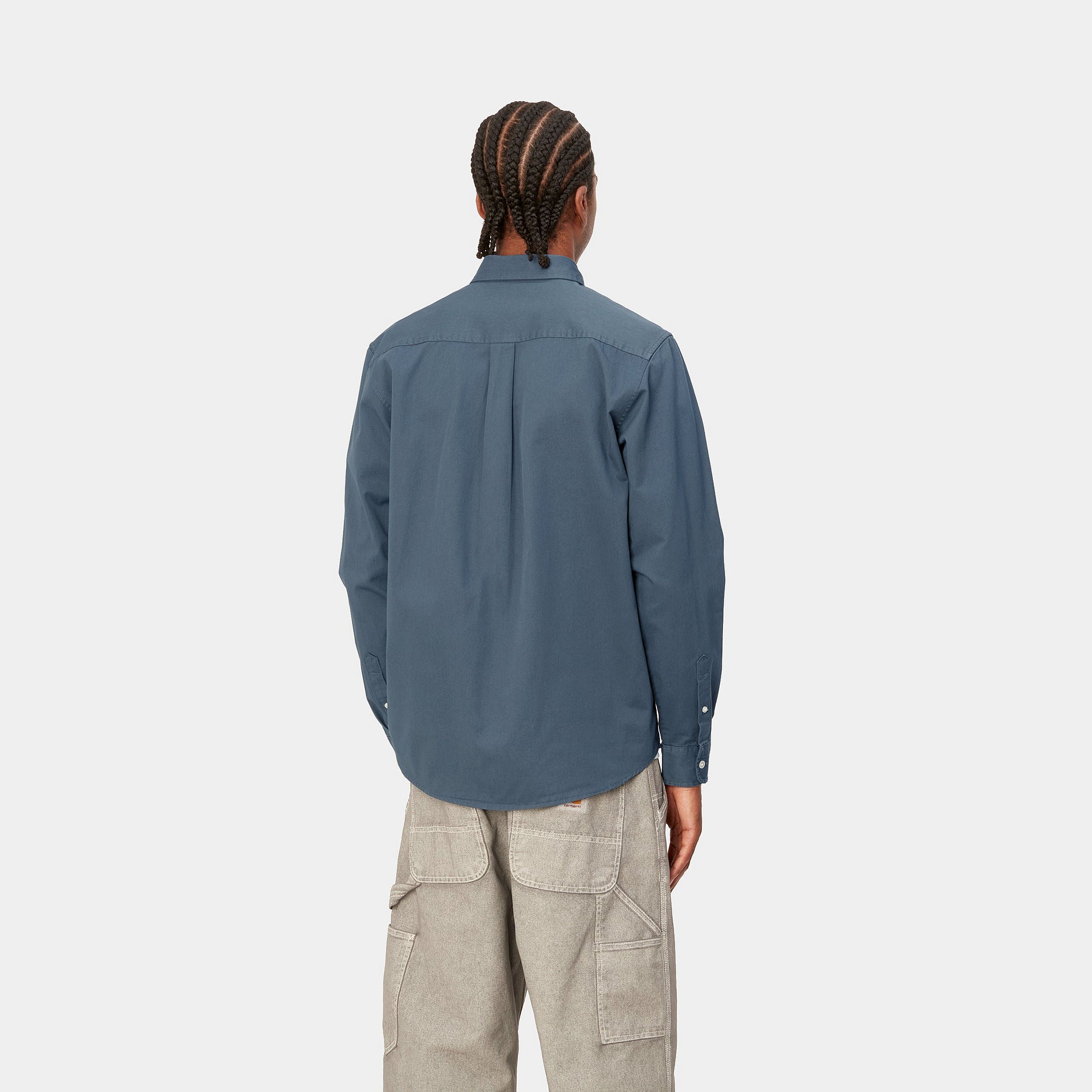 The Carhartt WIP Madison Shirt in a medium blue is a classic button-down shirt crafted from the highest quality mid-weight cotton twill. Pay for your order with Klarna and Paypal