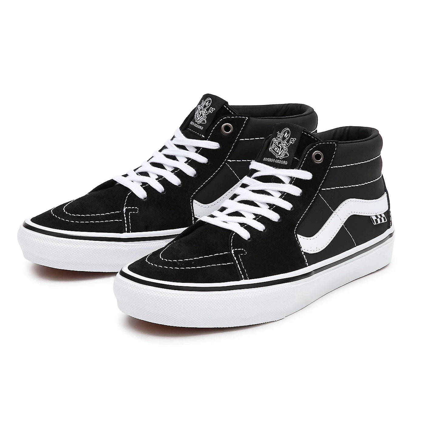 Black and white Jeff Grosso Vans mid top laced skate shoes with white sole. Free uk shipping over £50