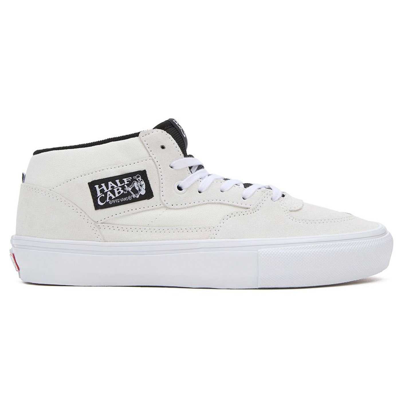 white half cab vans mid top laced skate shoes with white sole and black tongue. Free uk shipping over £50