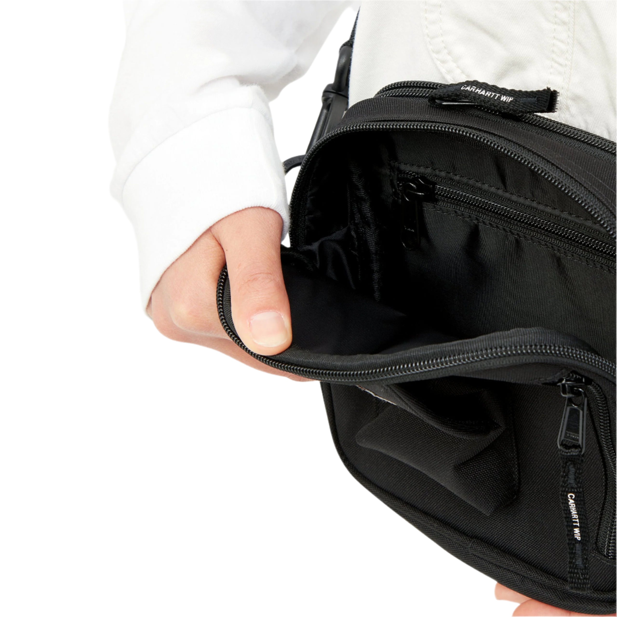 Small black Carhartt shoulder bag with woven logo. Free UK shipping on orders over £50.